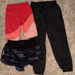 Bundle of 2 women's shorts and one pair of athletic pants, size XS.